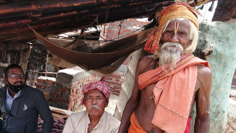 a man in a turban and traditional dress in Nepal