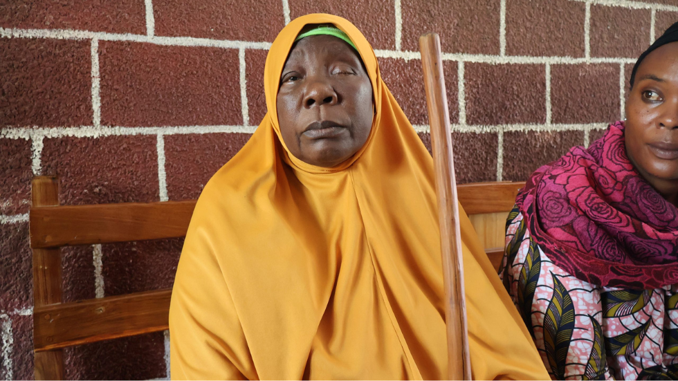 In Tanzania, a woman in a chador has an inflamed eye 
