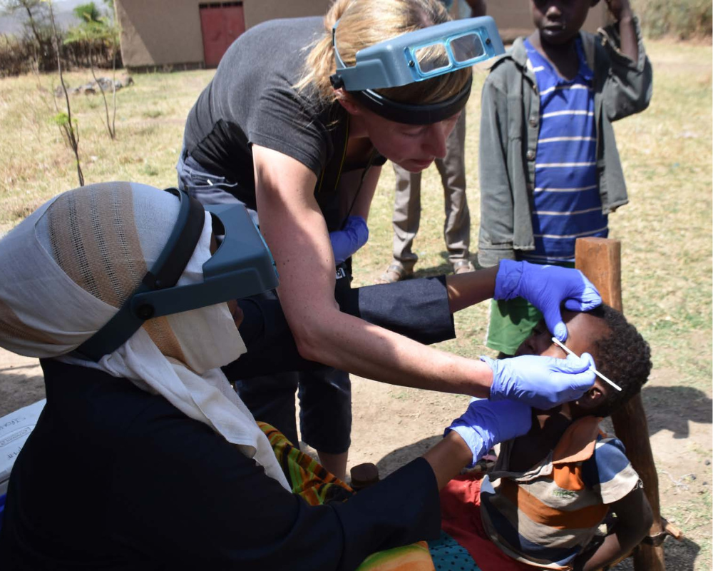 In Ethiopia, a researchers swabs a child's eye