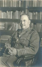 Ross in uniform seated[