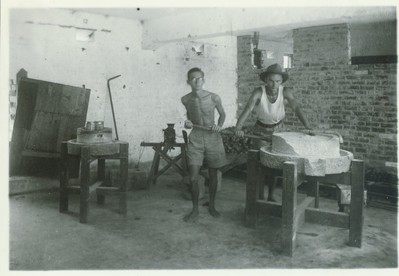 nutrition 45 Rice grinding in the Stanley prisoner of war camp_14519_