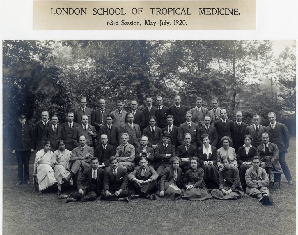 Black and white photograph of the 63rd Session at LSHTM. Shows four rows of men and women and M.S. Gore and A.S. Gore in Indian clothing on the second row. 