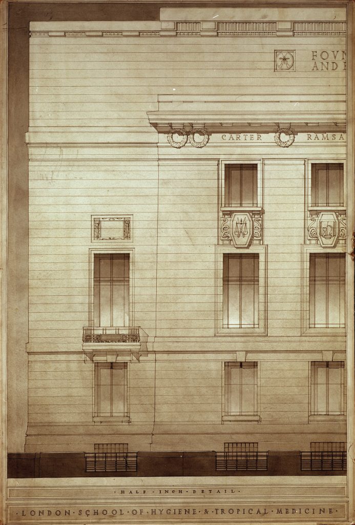 Close up sketch of a rectangular building showing 3 levels of windows with details of a set of scales below the top set of windows. The roof is flat and features Latin lettering below reading 'CARTER RAMSA-'. caption on the sketch reads 'half inch detail, London School of Hygiene and Tropical Medicine' 