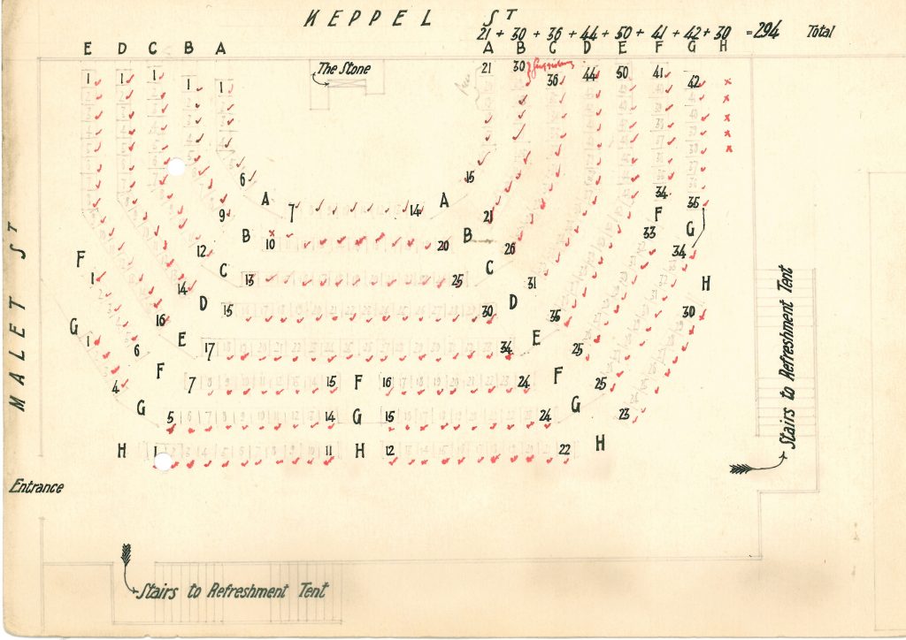 U shaped seating arrangement with check marks confirming which seats had been assigned. 